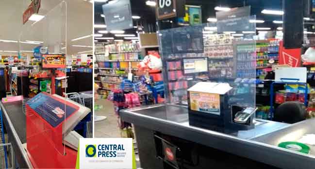 Placas em acrílico fazem proteção entre cliente e caixa de lojas e supermercados.